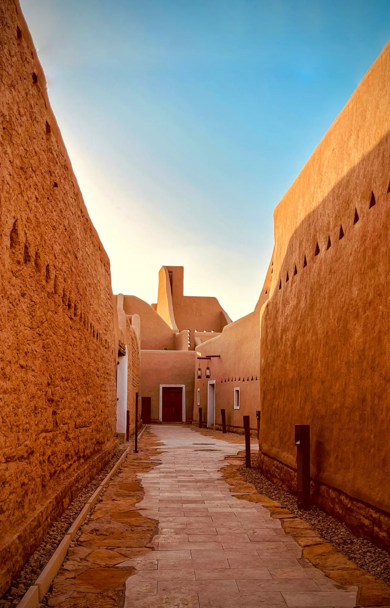 A narrow passage between earthen walls