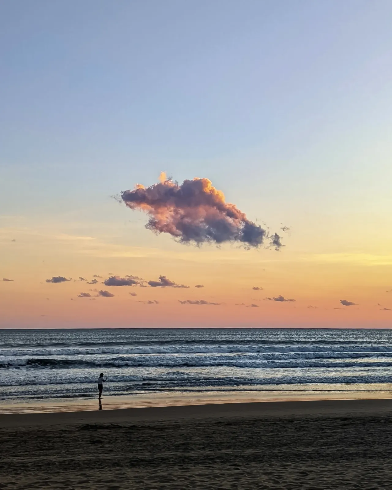 A cloud over the shoreline