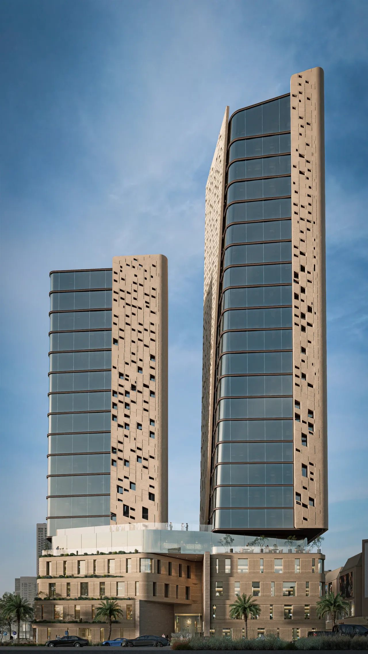 Current facade — daylight view of the towers and retail podium